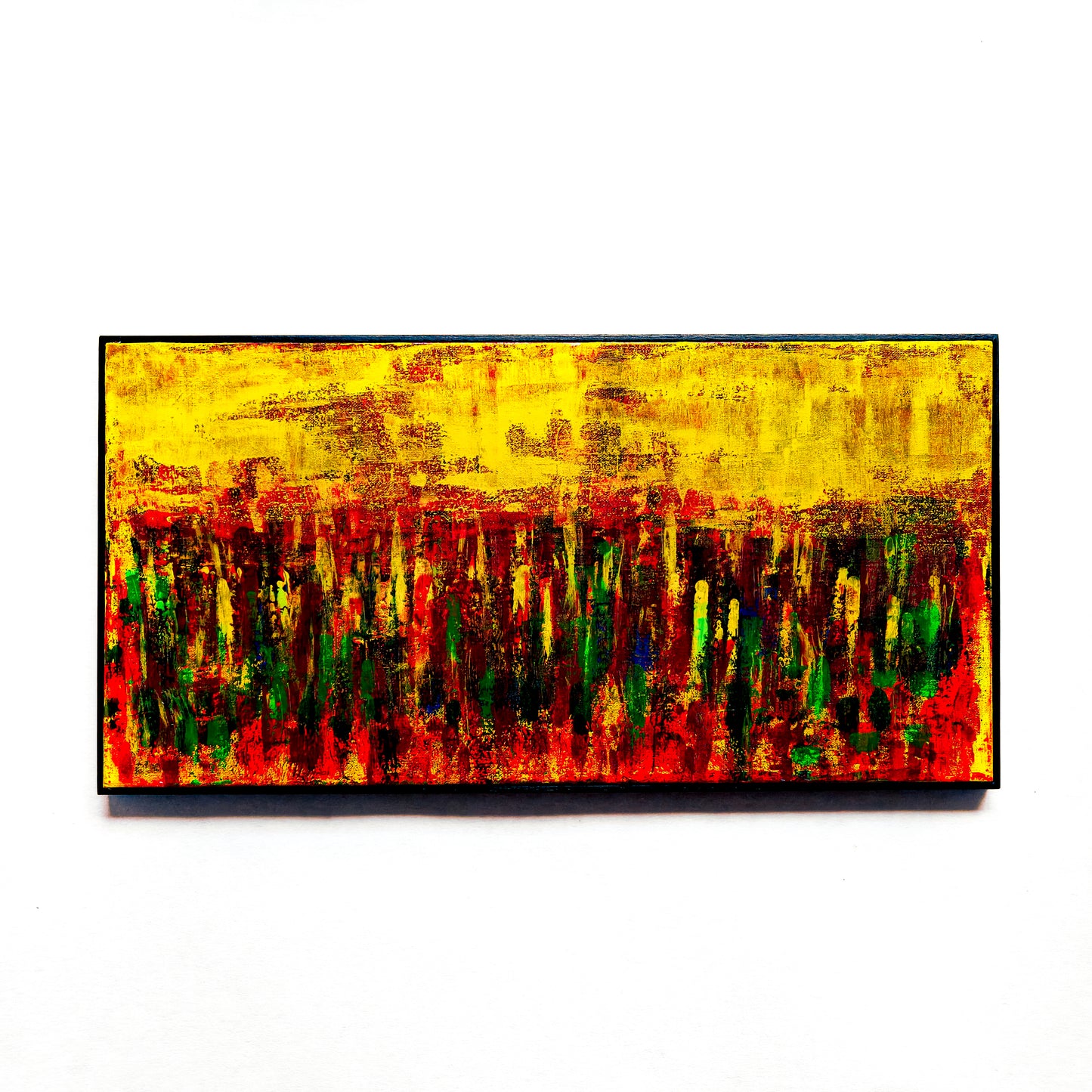 Abstract painting with vibrant colors on a white background