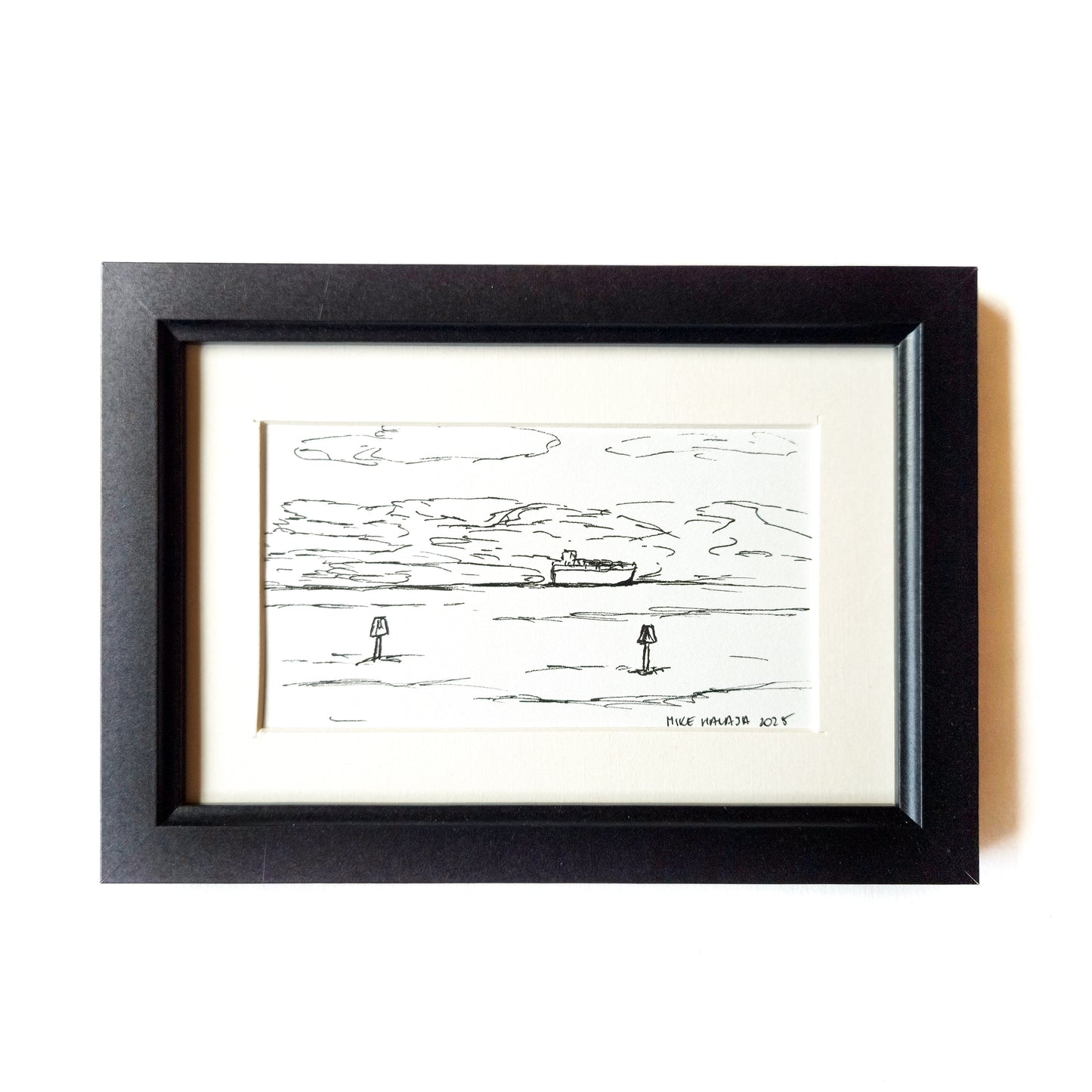 The artwork is a meticulously crafted ink drawing.