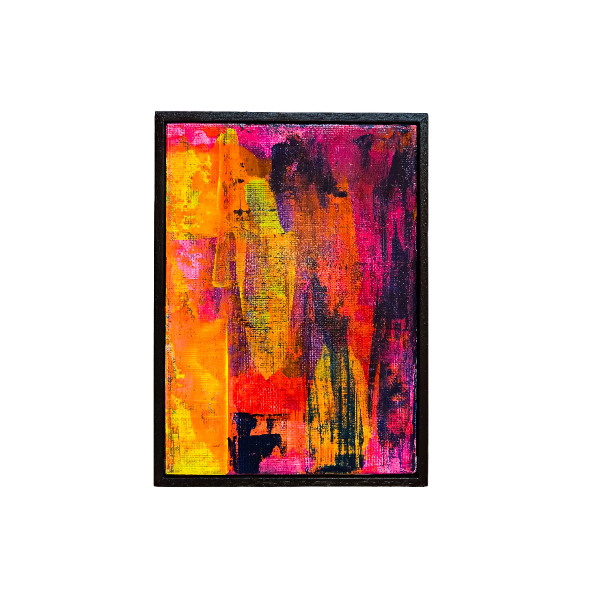 Framed abstract painting with vibrant colors on a white wall