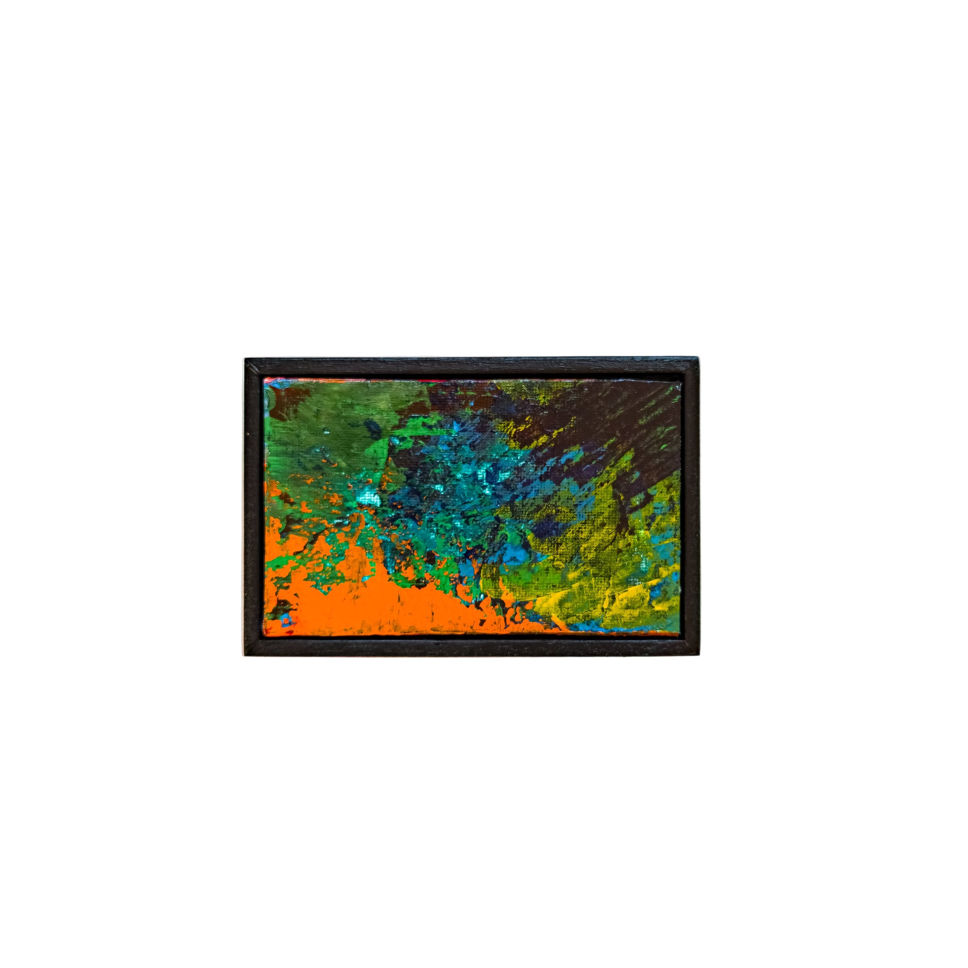 Abstract painting with orange, green, and blue colors in a black frame on a white background