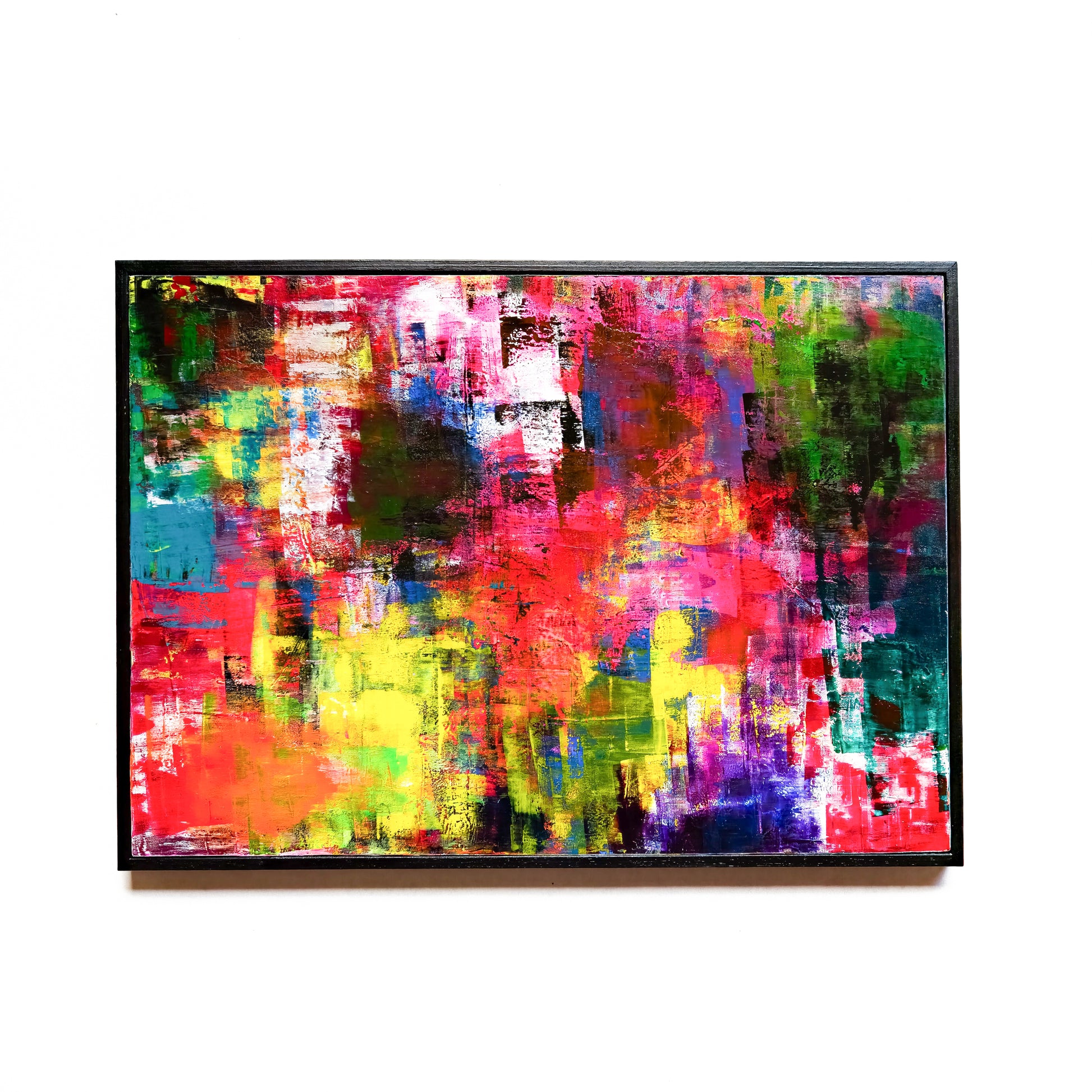 Abstract painting with vibrant colors on a white background