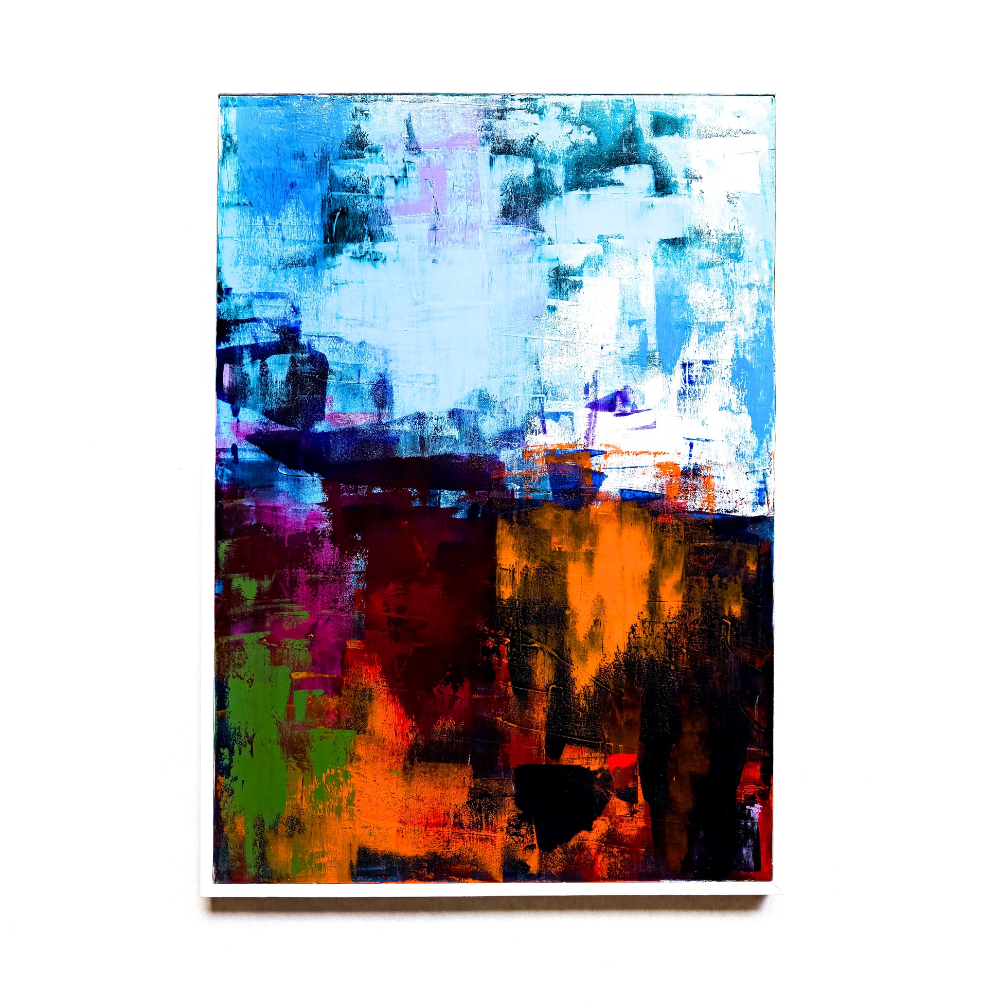Abstract painting with vibrant colors on a white background