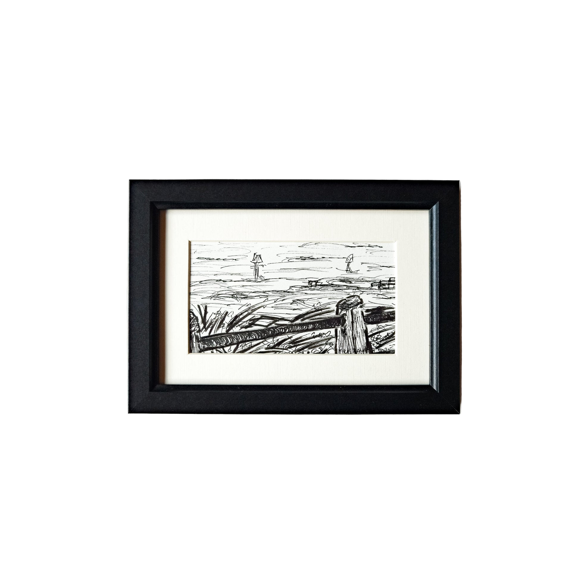 This image features a framed artwork titled "From the Boating Lake," created using acrylic ink and a fineliner. The artwork depicts a serene scene of a lake with boats and trees in the background, rendered in a minimalist style with a predominantly black and white color palette.