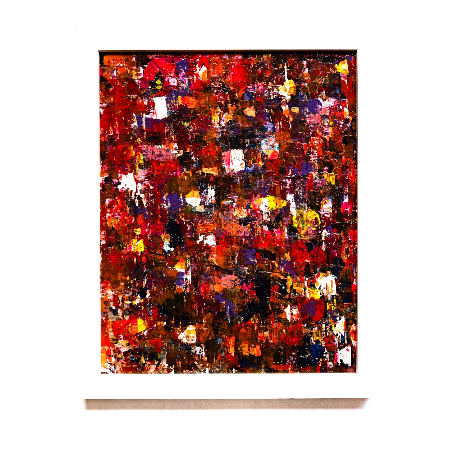 Framed abstract painting with wildflower meadow colour palette on the white background.  