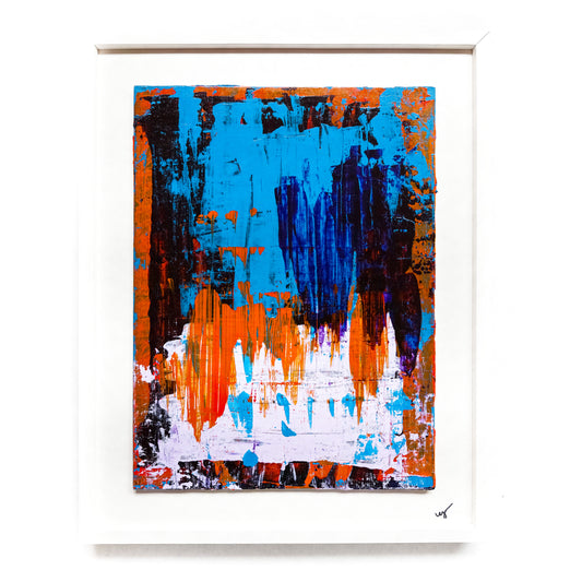 A framed abstract painting featuring geometric patterns with predominantly blue and orange colors on a white background.