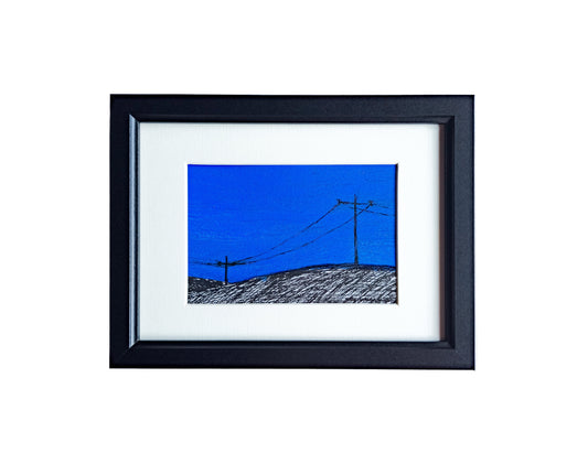 Framed ink sketch of pylons on the hill. 