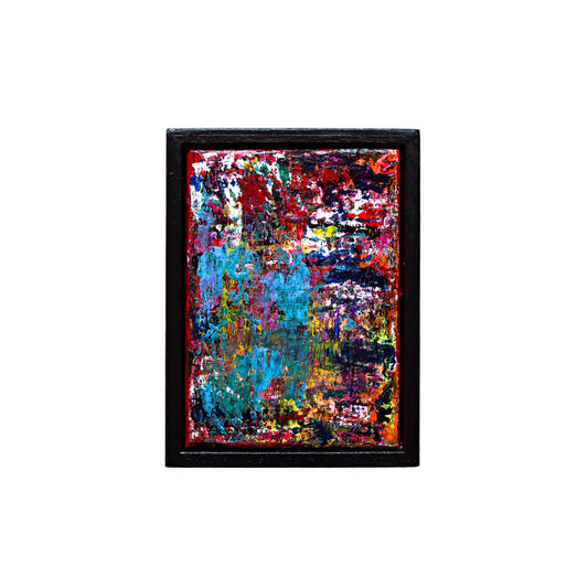 Framed abstract painting with multicolors on a white background